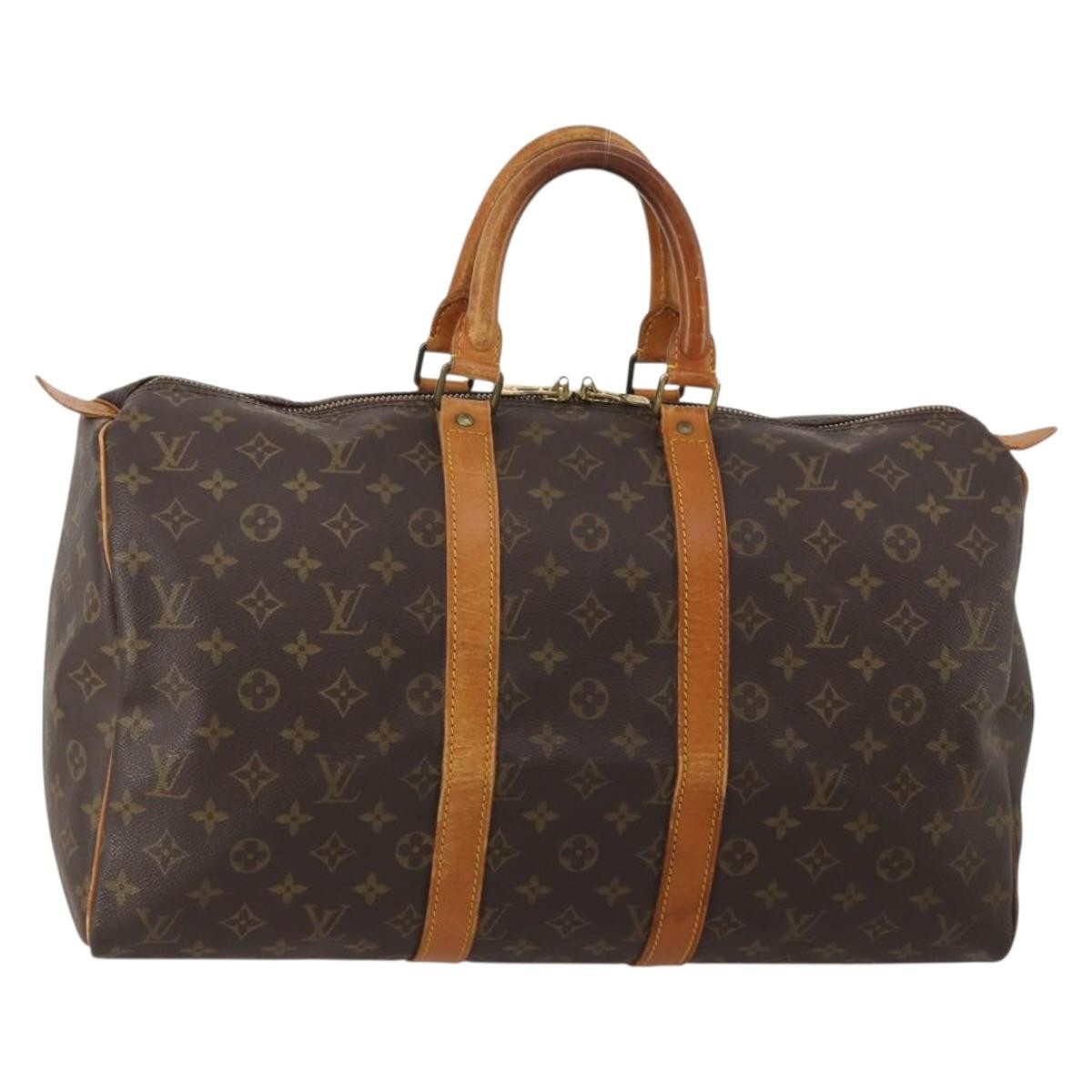 Louis Vuitton Keepall Monogram Canvas Brown Canvas Travel Bag Bag (Pre-Owned)