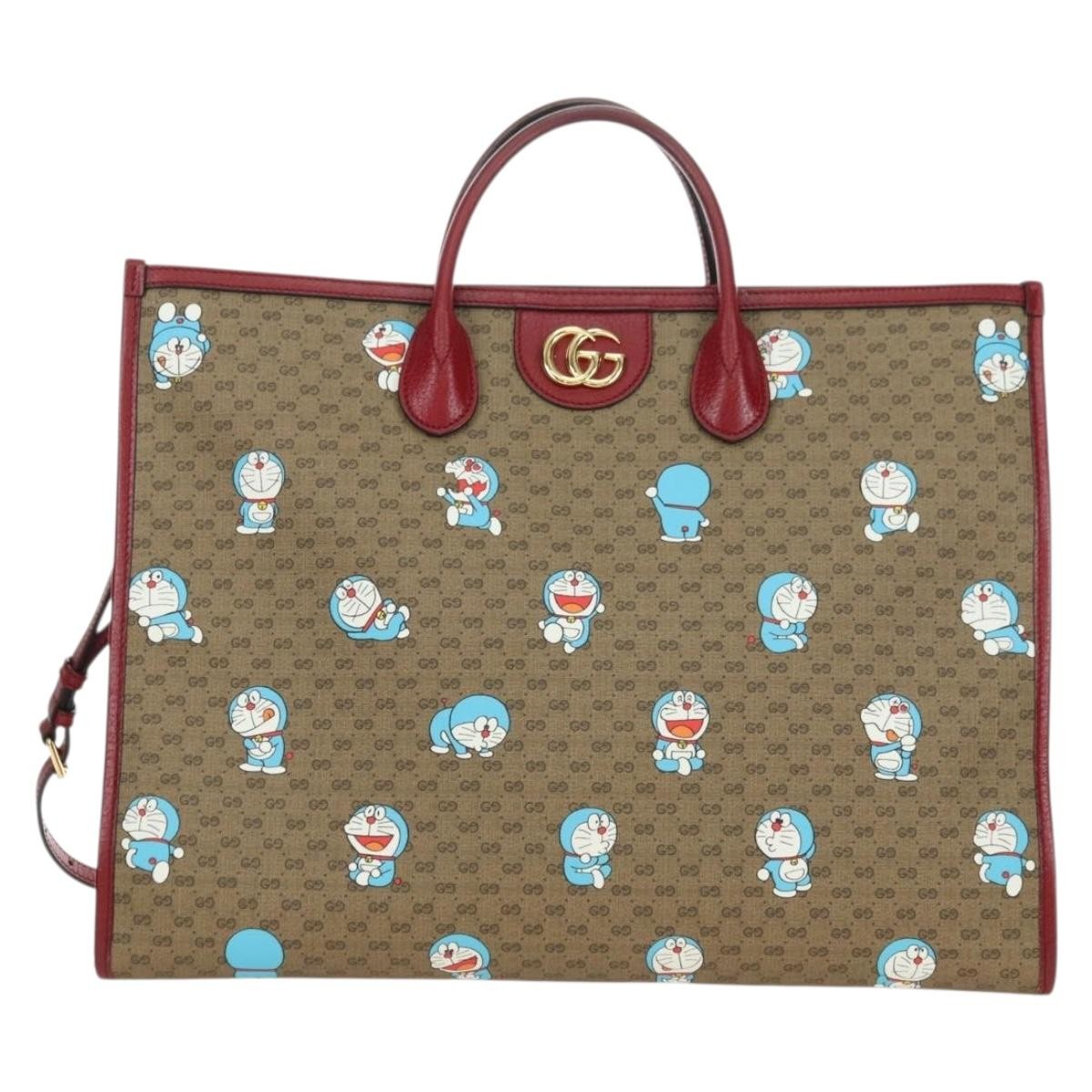 Gucci Doraemon Printed Mini Gg Coated Canvas Beige Canvas Tote Bag Bag (Pre-Owned)