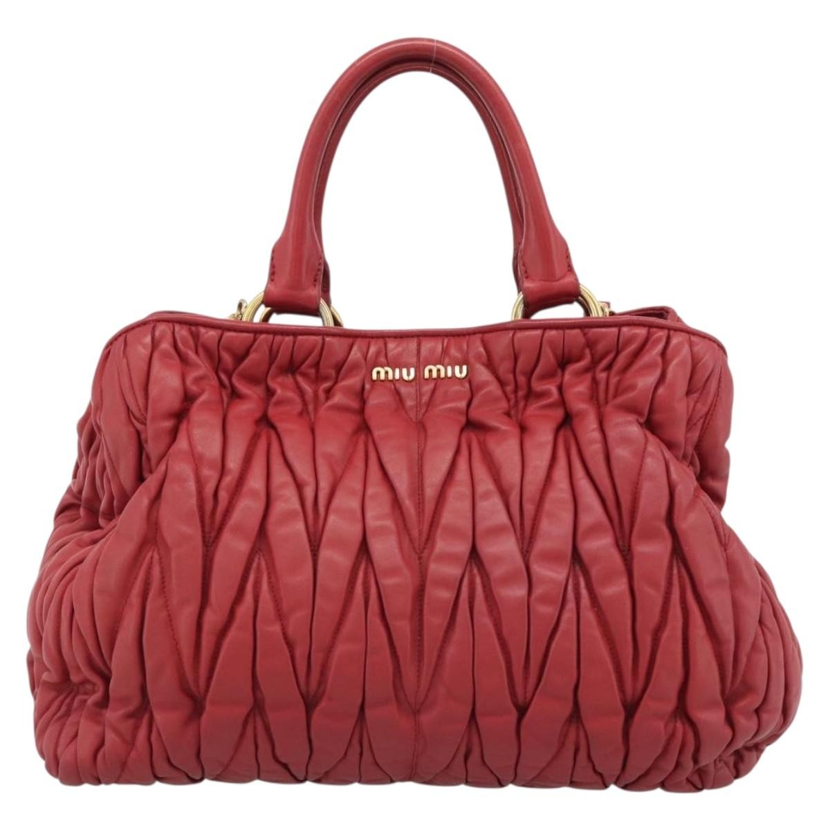 Miu Miu Matelassé Nappa Leather Top Handle Bag Leather Red Leather Clutche & Pouche Bag (Pre-Owned)