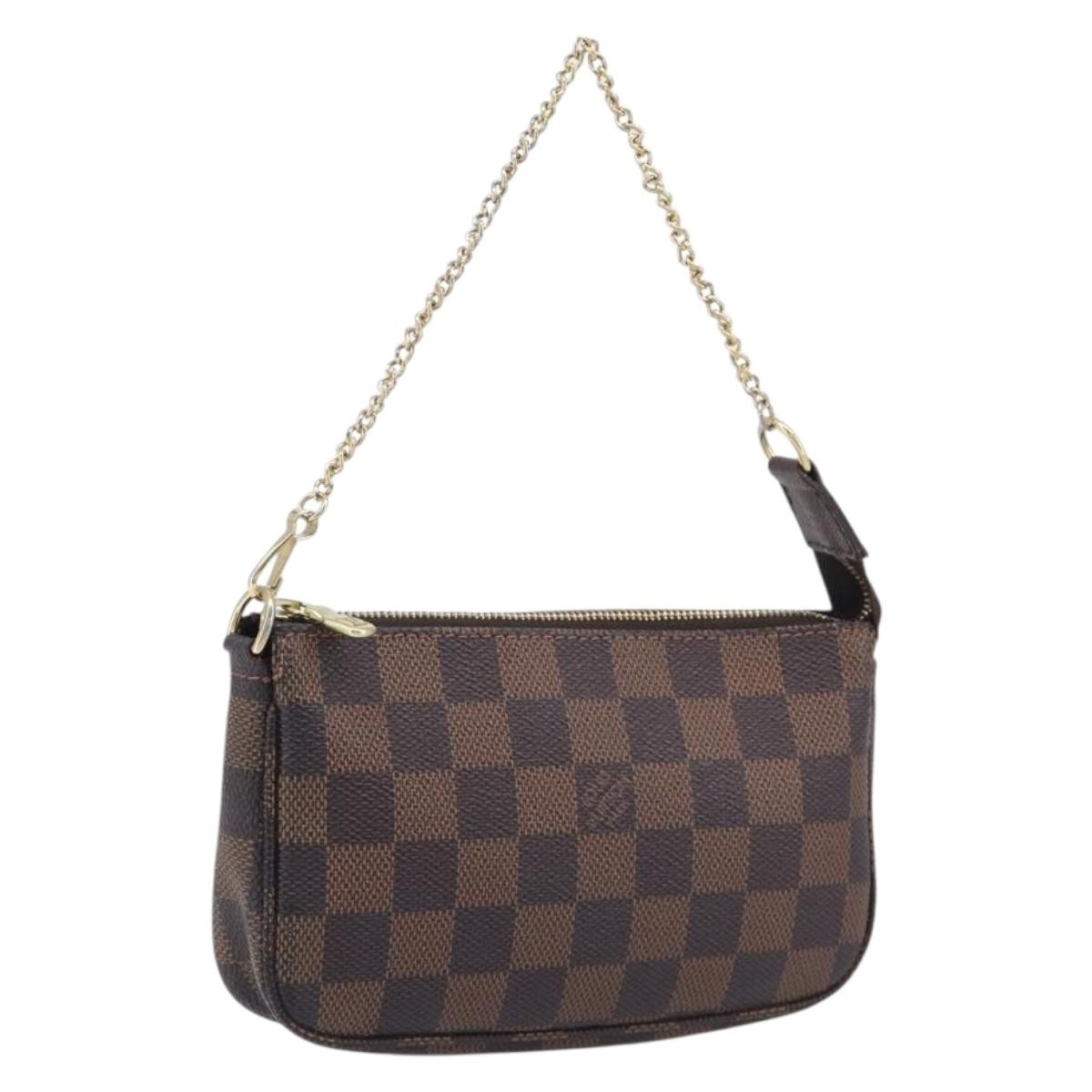 Louis Vuitton Pochette Accessoires Damier Ebene Brown Canvas Clutche & Pouche Bag (Pre-Owned)