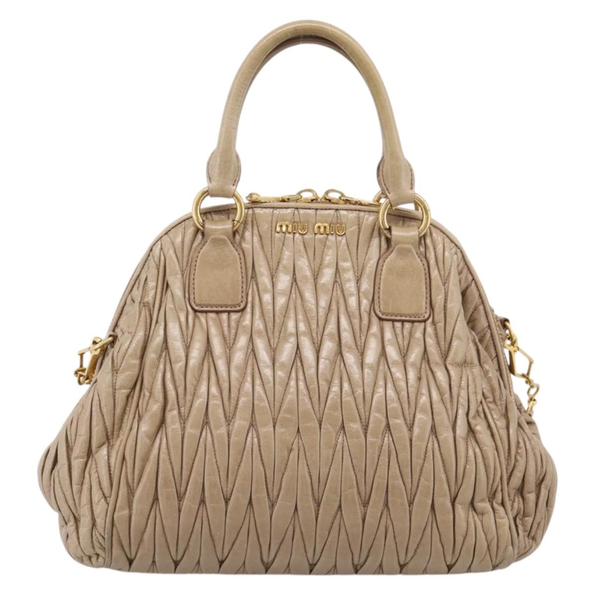 Miu Miu Convertible Dome Satchel Matelasse Leather Beige Leather Handbag (Pre-Owned)