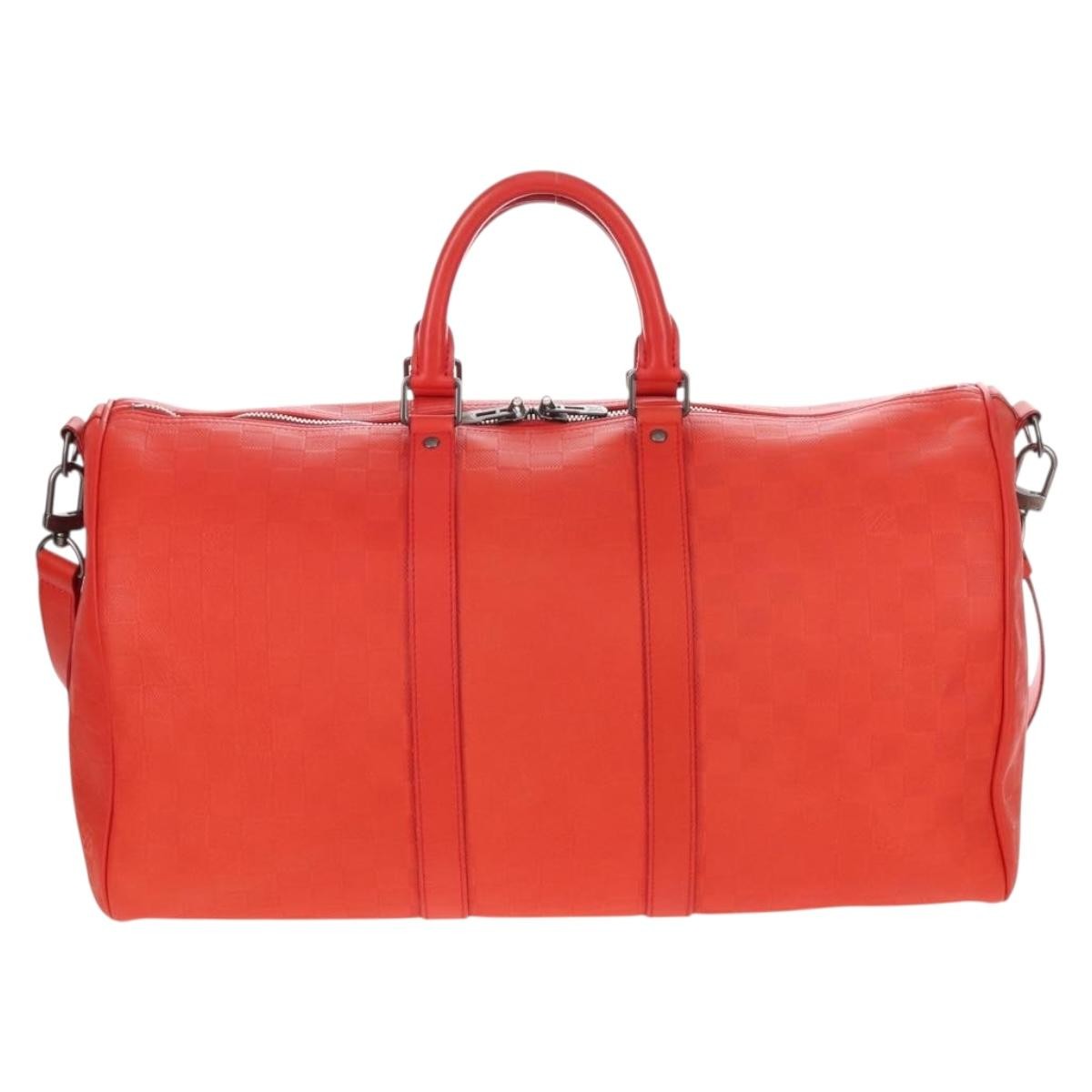 Louis Vuitton Keepall Bandouliere Damier Infini Leather Red Leather Travel Bag Bag (Pre-Owned)